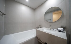 Deluxe Twin Room, City View | Bathroom | Shower, hair dryer, towels, soap