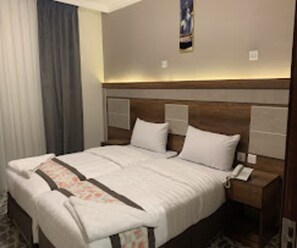 Chambre avec lits jumeaux