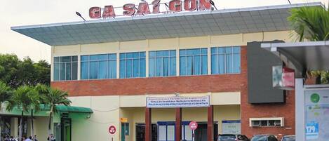 A building with a sign reading 'GA SAIGON' on the roof.
