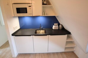 Refrigerador, microondas, parrilla de estufa y lavavajillas 