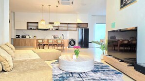 Luxury Villa, Private Pool | Living area | 72-inch LED TV with cable channels, smart speakers - Quint Pool Villas (Pattaya)