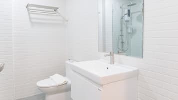 Shower, free toiletries, hair dryer, slippers