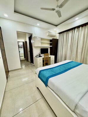 Luxury Apartment, Balcony, City View | Desk, laptop workspace, blackout drapes, iron/ironing board - Happy Feet Boutique Homestay (Dehradun)