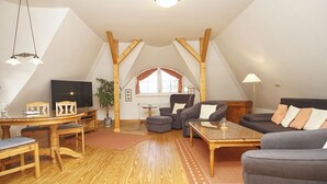 Living area - Rügen vacation near the beach - Landhaus Wilkens vacation apartment Reetblick (Baabe)