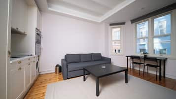 Superior Condo | Living room | 100-cm plasma TV with digital channels