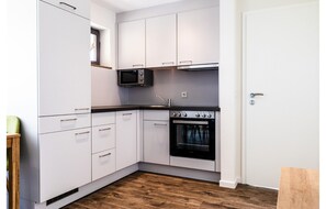 House | Private kitchen | Highchair - Bungalow im Campingpark (Waxweiler)