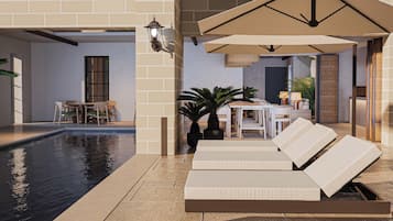 Kolam renang outdoor, dengan cabana gratis dan payung kolam renang