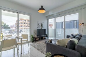 Apartment, 1 Double Bed with Sofa bed, Kitchen, City View | Living area | Smart TV, Netflix, streaming services - Artemis 1-BR Apt. & Terrace in Larnaca (Larnaca)