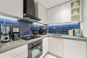 Private kitchen - FIRST CLASS | 2BR |Sleek Escape | Near Dubai Mall (Business Bay)