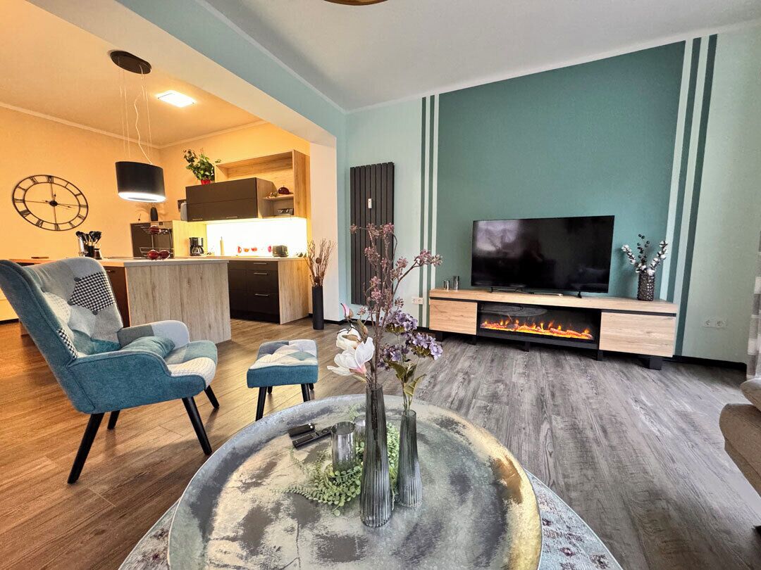 Smart TV, fireplace, DVD player, books