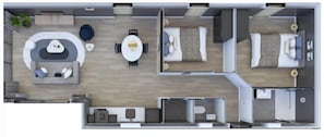 A modern hotel layout with a central dining area, two bedrooms, a bathroom, and a kitchenette.