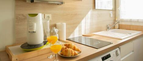 Fridge, microwave, stovetop, coffee/tea maker