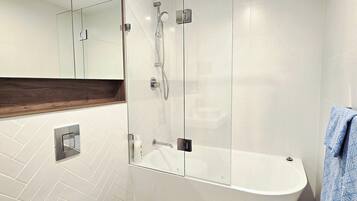 Shower, towels, soap, shampoo