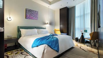 Down duvets, laptop workspace, blackout curtains, iron/ironing board