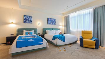 Down comforters, laptop workspace, blackout drapes, iron/ironing board