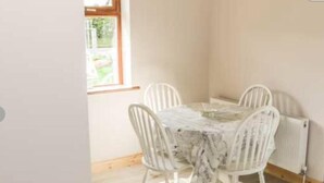 Apartment, 2 Bedrooms, Accessible, Smoking | Dining room - Reek View - Two Bedroom Cottage (Westport)