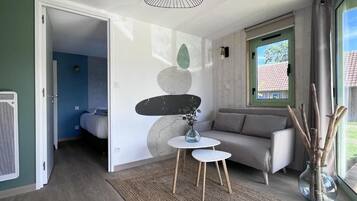 Rideaux occultants, chambres insonorisées, fer et planche à repasser