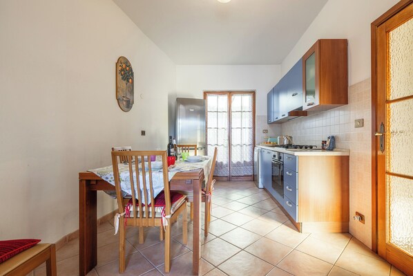 Apartment, Patio, City View | Private kitchen - AffittaSardegna - Quadri Lentu e Mari (Porto Torres)
