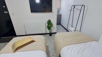 1 Schlafzimmer, BĂŒgeleisen/BĂŒgelbrett, kostenloses WLAN, BettwĂ€sche