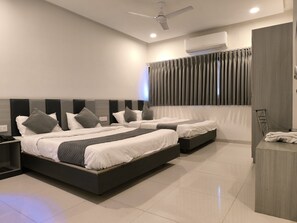 Family Quadruple Room, City View | Desk, laptop workspace, iron/ironing board, free WiFi - HOTEL SELFIE INN (Ahmedabad)