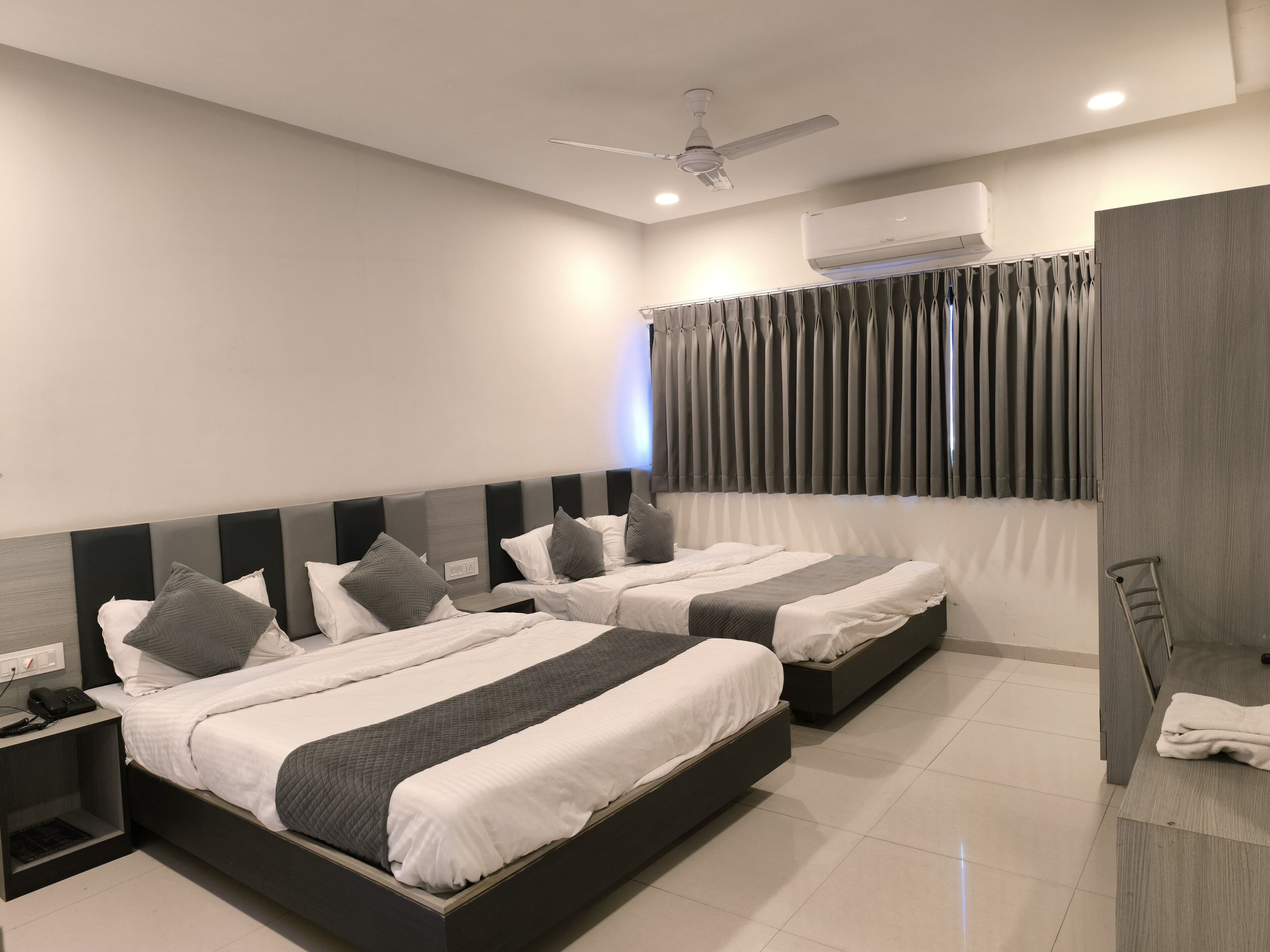 Family Quadruple Room, City View | Desk, laptop workspace, iron/ironing board, free WiFi