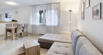 Ferienwohnung, 60 m² mit Gemeinschaftsterrasse, privatem Garten und WLAN