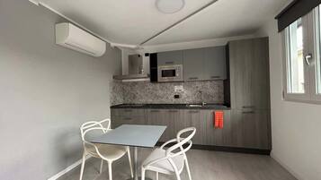 Fridge, microwave, stovetop, electric kettle