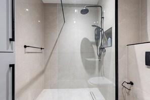 Shower, towels, soap, toilet paper