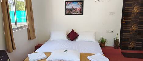 Kahden hengen deluxe-huone, näköala puutarhaan | Silitysrauta/-lauta, ilmainen Wi-Fi