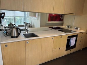 Fridge, microwave, oven, stovetop - Welcome to Tasha’s Apartments in Walkerville (Walkerville)