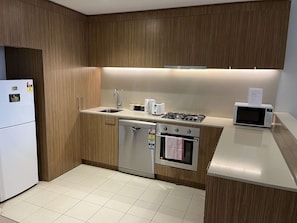 Private kitchen - Tasha's Apartments on Morphett (Adelaide)