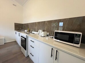 Private kitchen - Tasha's Duplex on Muller (Greenacres)