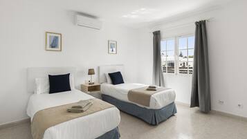 2 dormitorios, caja fuerte, wifi gratis y ropa de cama