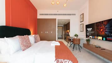 Premium bedding, down duvets, memory-foam beds, in-room safe