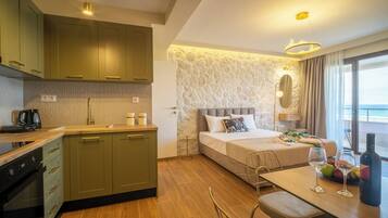 Suíte estúdio básica, vista para a praia | Cozinha privada | Frigobar, fogão, cooktop, lava-louças