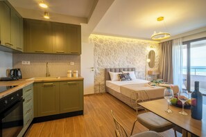 Basic Studio Suite, Beach View | Private kitchen | Mini-fridge, oven, stovetop, dishwasher