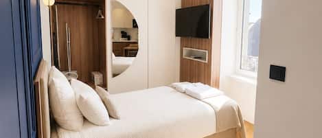 Apartamento luxo | Cofres nos quartos, ferros/tábuas de passar roupa, Wi-Fi de cortesia