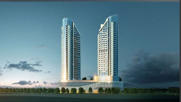Two high-rise buildings with a modern design, featuring a prominent central structure and a symmetrical layout. - Luxury Living at Cloud Tower JVT with  (Dubai)