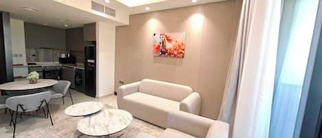 Apartamento standard, 1 quarto | Área de estar