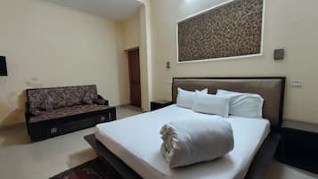 Rom – standard, byutsikt | Wi-fi (inkludert) og sengetøy