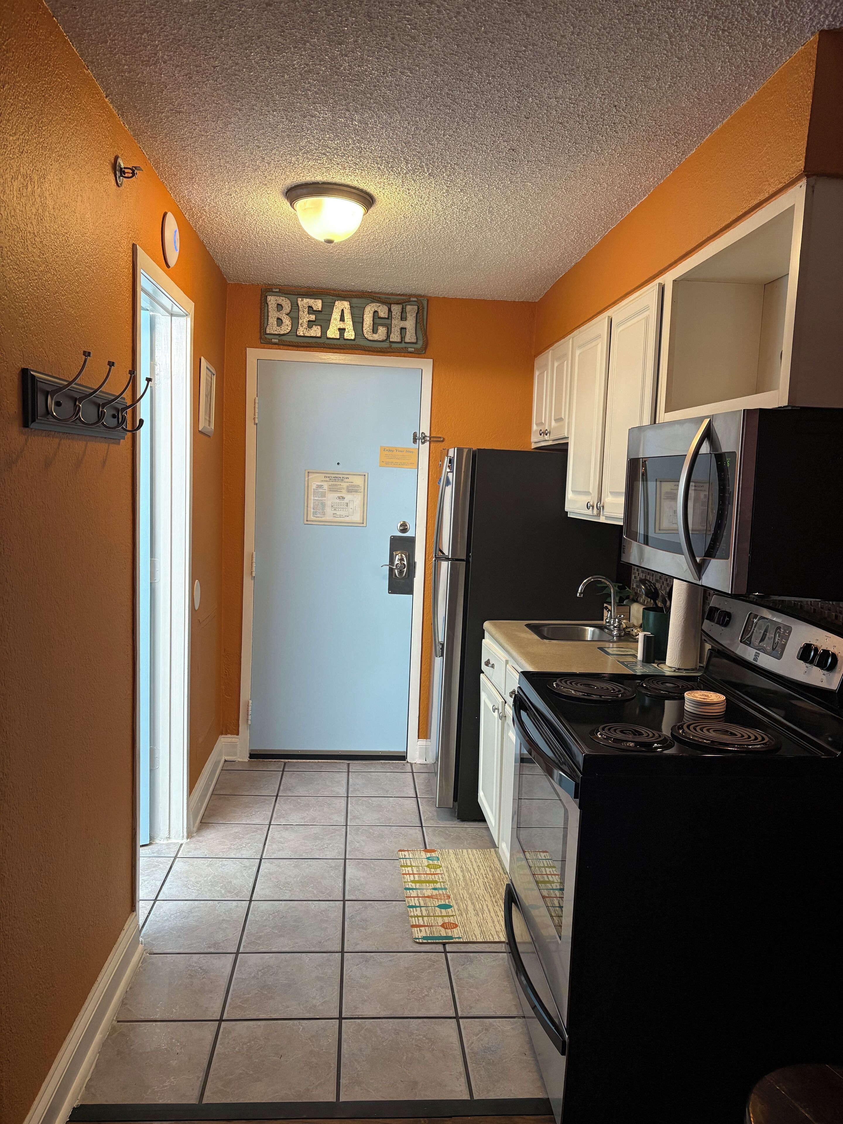 Fridge, microwave, stovetop, paper towels