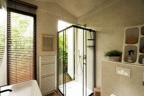 Shower, hair dryer, towels, soap