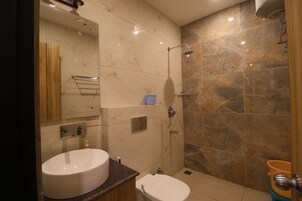 Shower, free toiletries, towels, soap