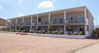 Spacious 40 square meter apartment with independent access via magnetic card. The accommodation includes a fully equipped kitchenette, a living room with a comfortable sofa bed for two, a bedroom with a double bed, and a private bathroom with a shower an