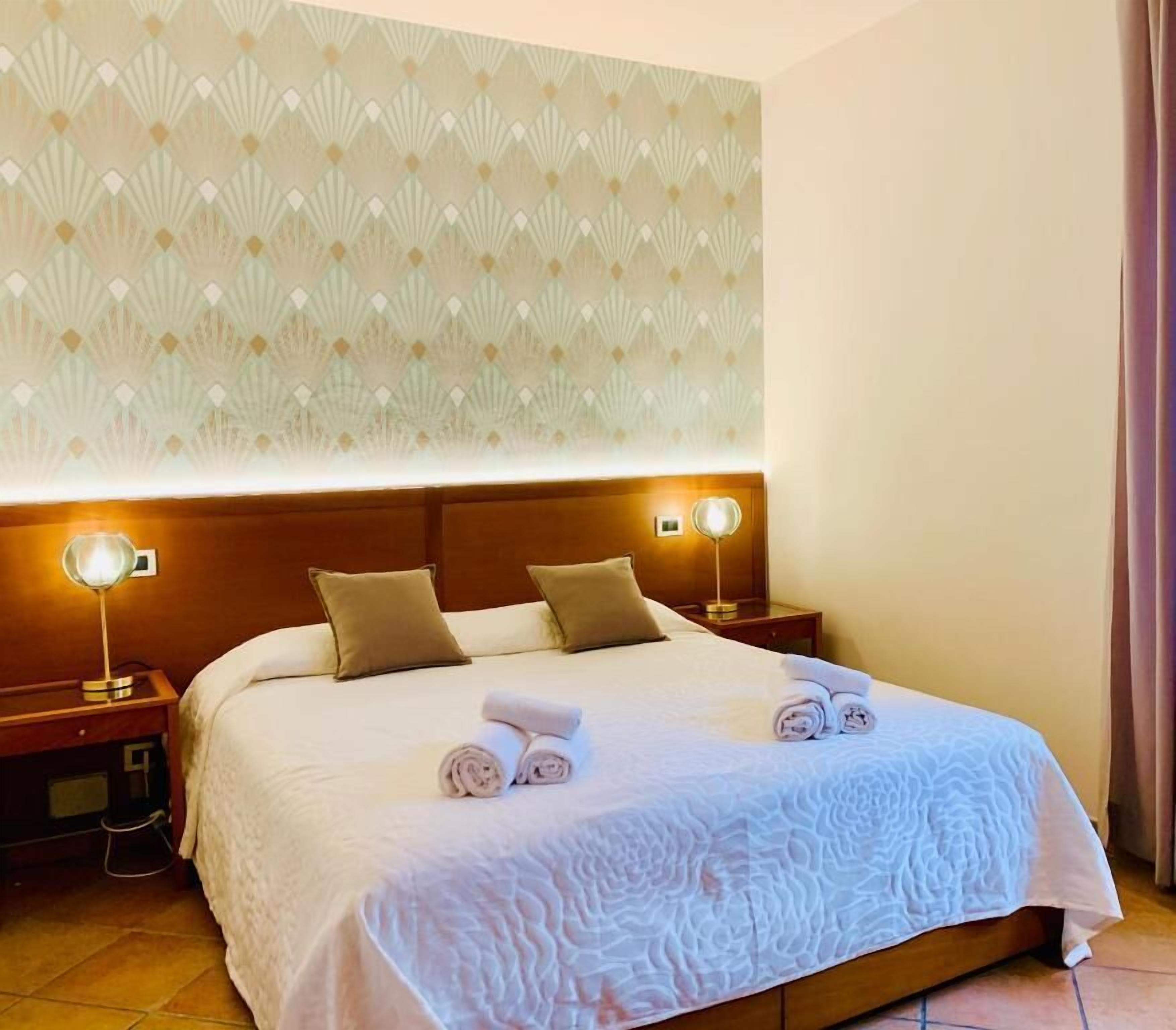 Appartement Deluxe, vue ville | Coffres-forts dans les chambres, chambres insonorisées, Wi-Fi gratuit