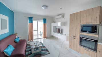 Lägenhet - utsikt mot staden | Vardagsrum