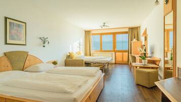 Deluxe Double Room, Balcony, Mountain View | In-room safe, laptop workspace, blackout drapes, iron/ironing board
