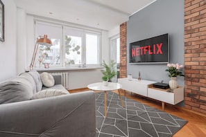 Classic Apartment, Courtyard View | Living area | 40-inch plasma TV with digital channels - Lumina apartment near center of Warsaw (Warsaw)