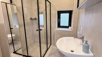 Hair dryer, bidet, towels, soap