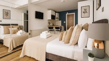 1 habitación, tabla de planchar con plancha, wifi y ropa de cama